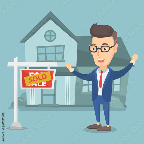 Real estate agent with sold placard.