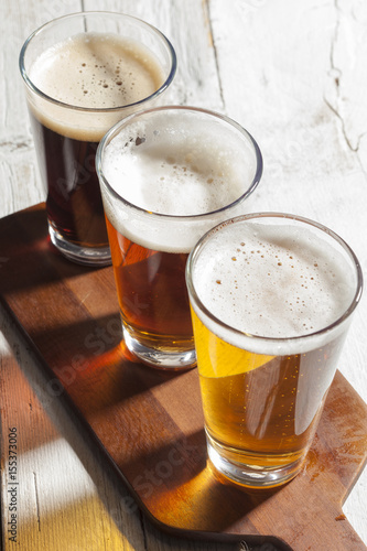 Assorted beers in a flight ready for tasting