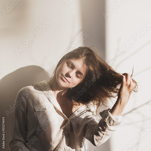portrait of a beautiful girl in a white shirt, beauty, fashion