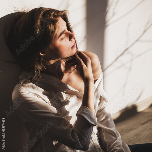 portrait of a beautiful girl in a white shirt, beauty, fashion
