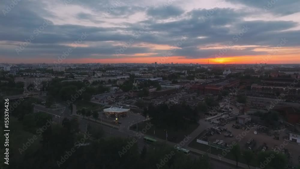 Aerial view, evening view of the city at sunset. 50 fps. View from a height.
Aerial view, evening view of the city at sunset. 50 fps. View from a height.