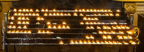 Candles burn in the Christian church