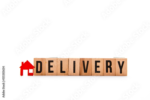 Home Delivery - block letters with red home / house icon with white background 