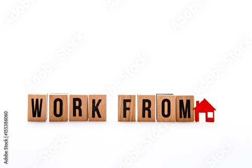 Work from Home - block letters with red home / house icon with white background 