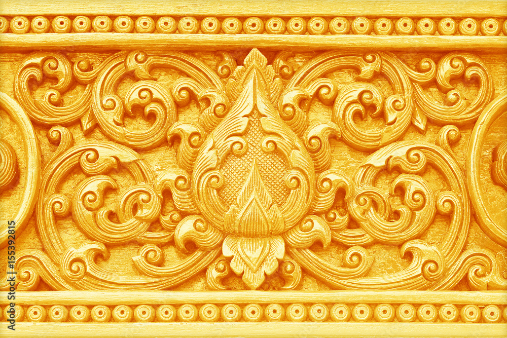 Pattern of flower carved on wood background