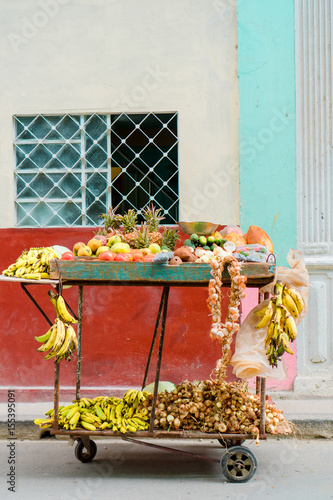 Photography A small cart of fruits and vegetables on the street of Old Havana area for sale