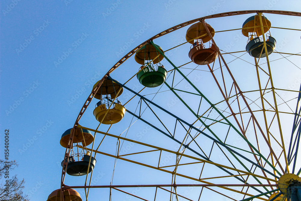 Ferris wheel in a city park Ferris wheel in a city park