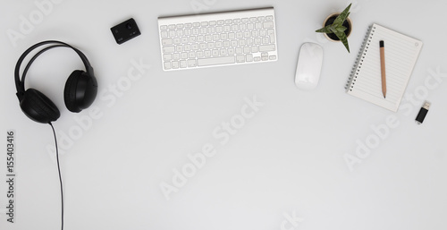 Office Desk with Headphones, Action Camera 4K, Fat plant, Notepad and Usb drive
