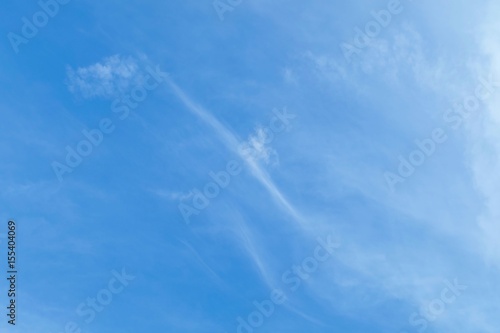 Blue Sky Background with Tiny White Clouds