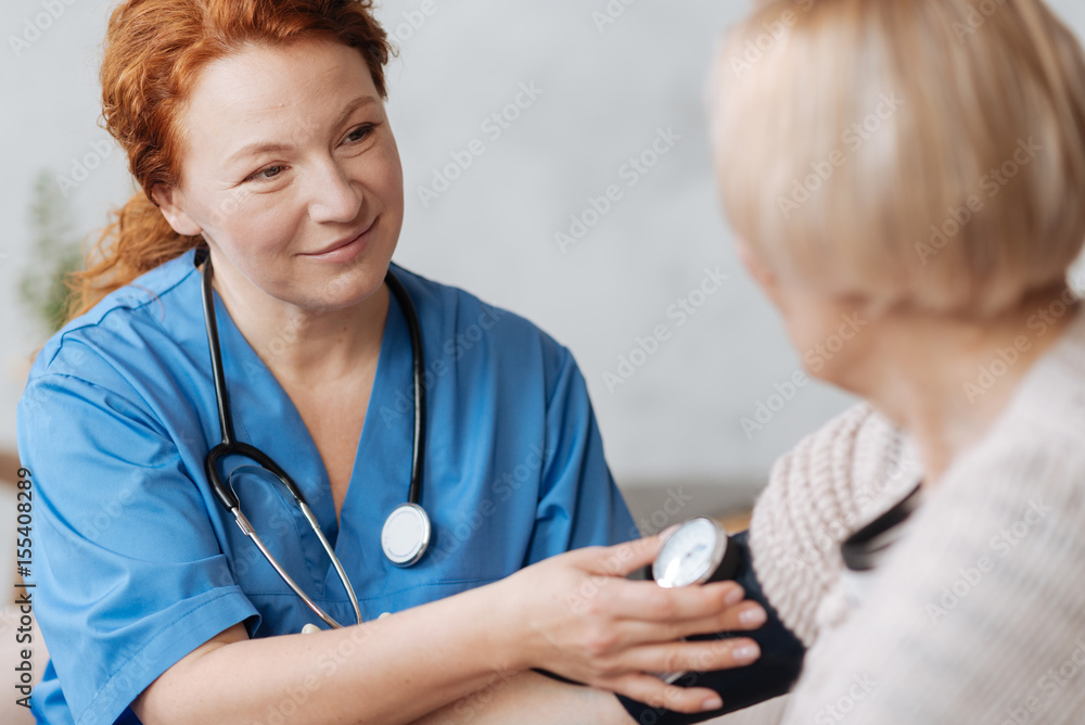 Mindful excellent private doctor consulting her patient Mindful excellent private doctor consulting her patient