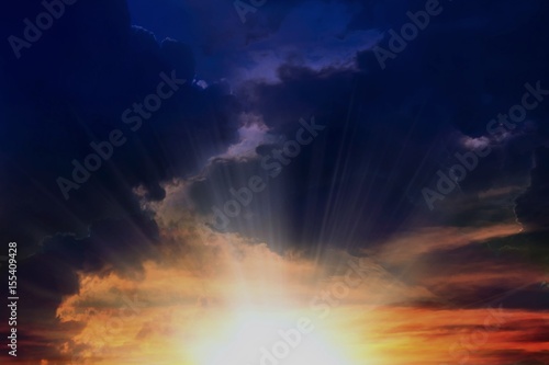  Sunset or sunrise with clouds, light rays and other atmospheric effect 