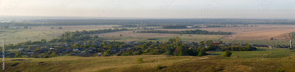 Obraz premium Panoramic landscape. View, from the hills to the village.
