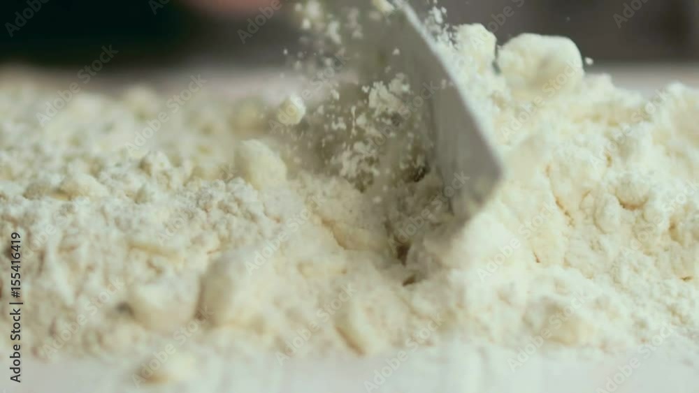 Butter is chopped and mixed with flour Butter is chopped and mixed with flour