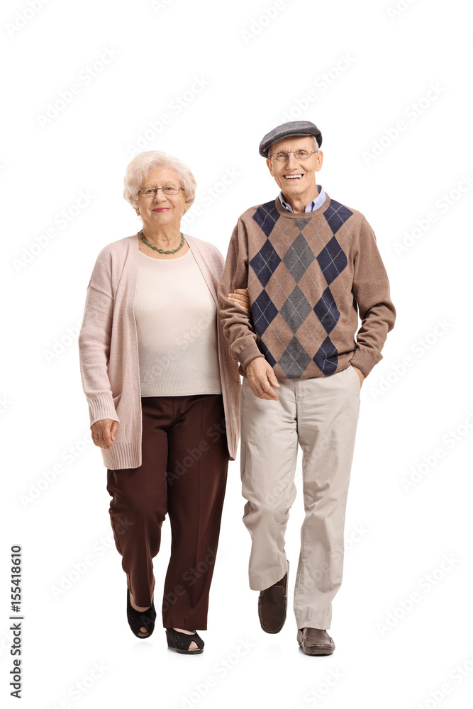Elderly couple walking towards the camera Elderly couple walking towards the camera