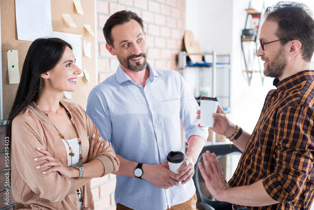Fototapeta premium Happy smiling colleagues having conversation