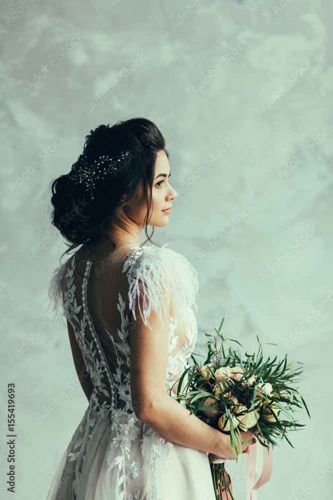 Beautiful bride portrait with wedding bouquet Beautiful bride portrait with wedding bouquet