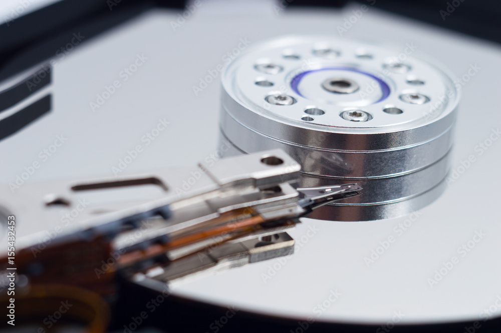 A opened computer hard drive closeup A opened computer hard drive closeup