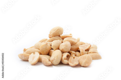 Fried salted peanuts on white background. snack