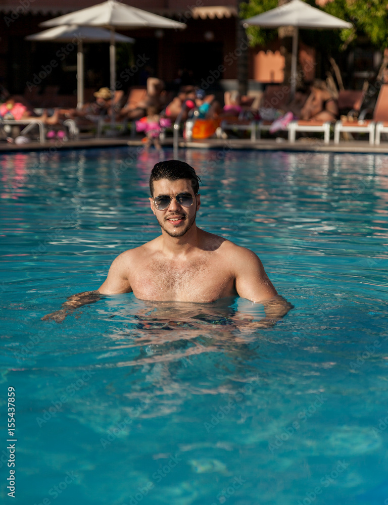 Handsome man in pool