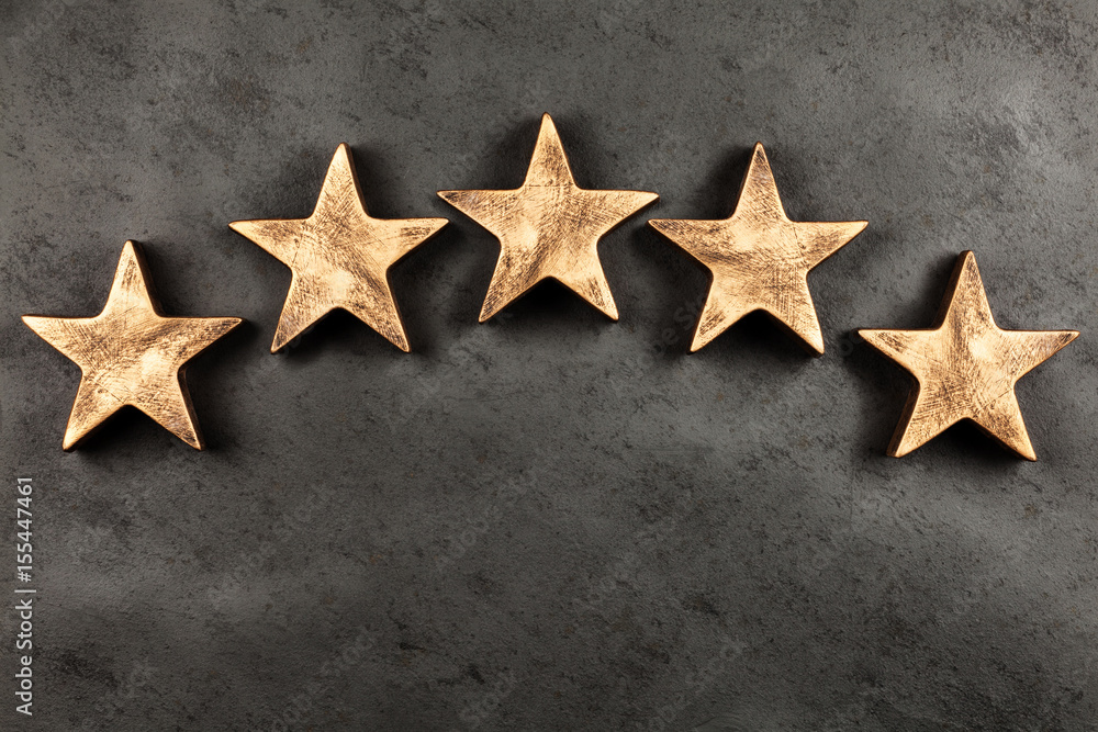Five stars on dark background Five stars on dark background