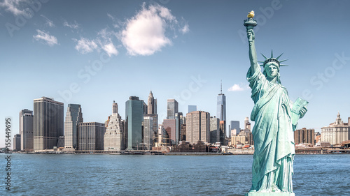 The statue of Liberty, Landmarks of New York City with Manhattan building background
