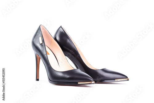 Pair of black elegant high heel shoes isolated on white background