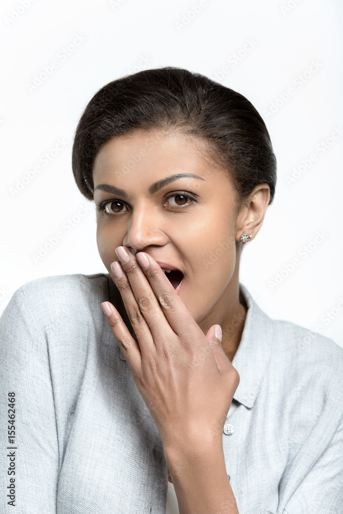 portrait of young amazed african american woman isolated on white portrait of young amazed african american woman isolated on white