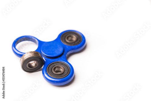 Konstfotografi Dislodged broken weight from fidget spinner dangerous to kids