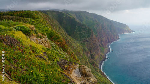 Madeira - Ponta do Pargo with green rocks and abrupt cliffs to the blue ocean