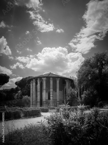 Temple of Hercules Victor, or Tempio Di Vesta with cloudy sky
