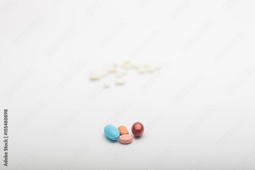 red, blu pills medicine on white background red, blu pills medicine on white background