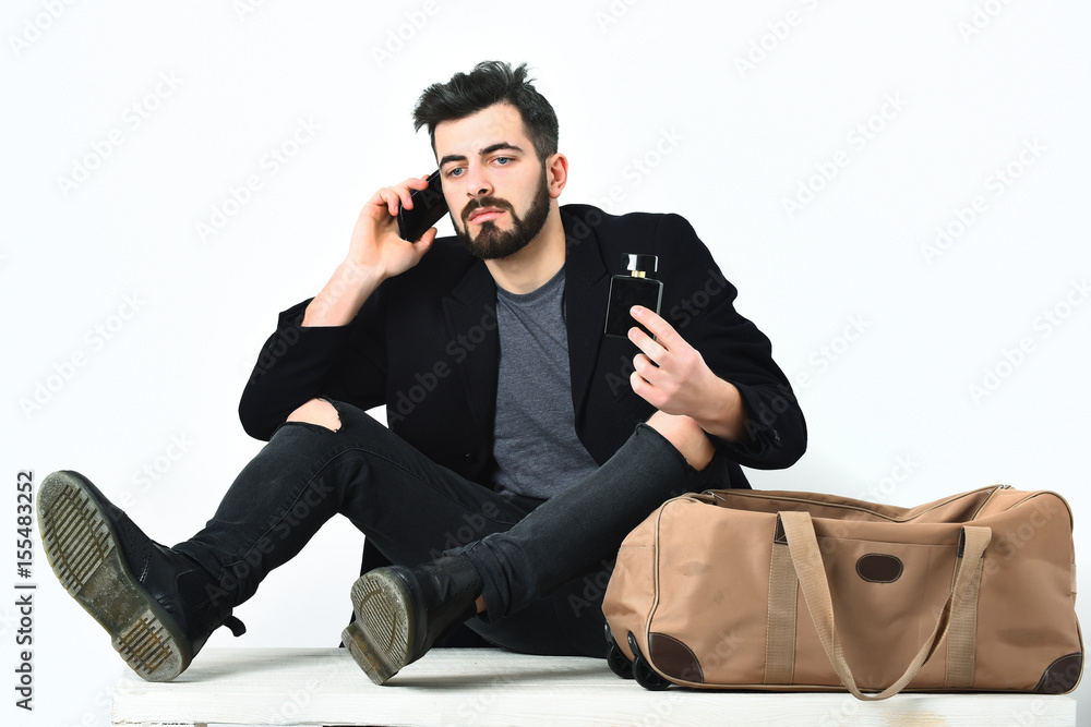 Bearded man, caucasian hipster with moustache and cell phone Bearded man, caucasian hipster with moustache and cell phone