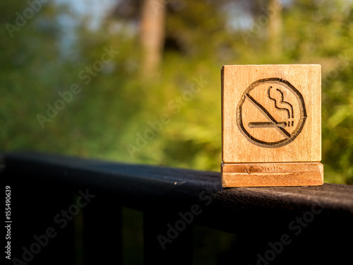 No smoking sign with nature background.