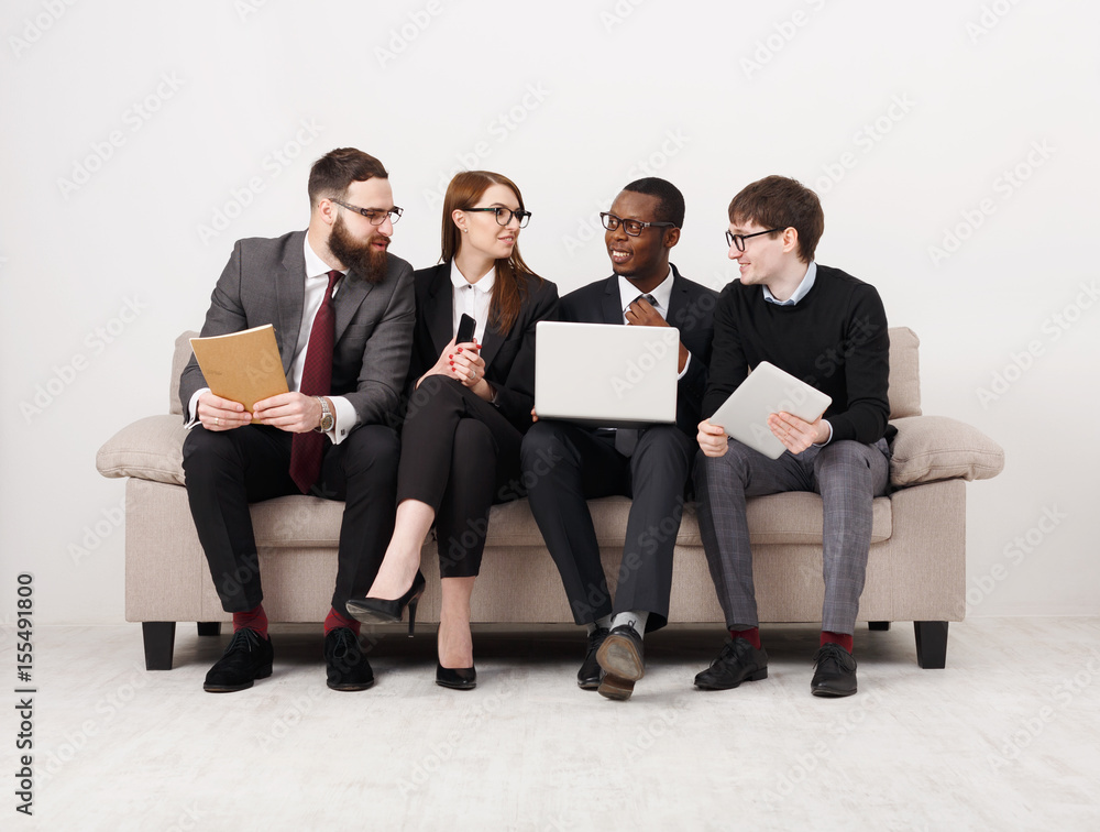 Young business people discuss marketing strategy Young business people discuss marketing strategy
