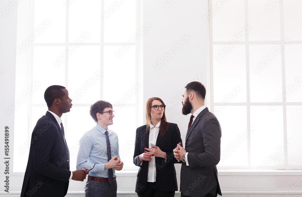 Corporate meeting in office, business people with copy space Corporate meeting in office, business people with copy space