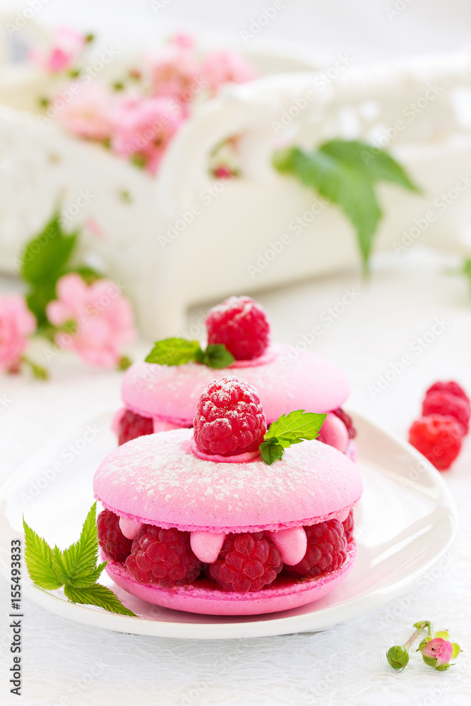 French makarons cake with raspberries. French makarons cake with raspberries.