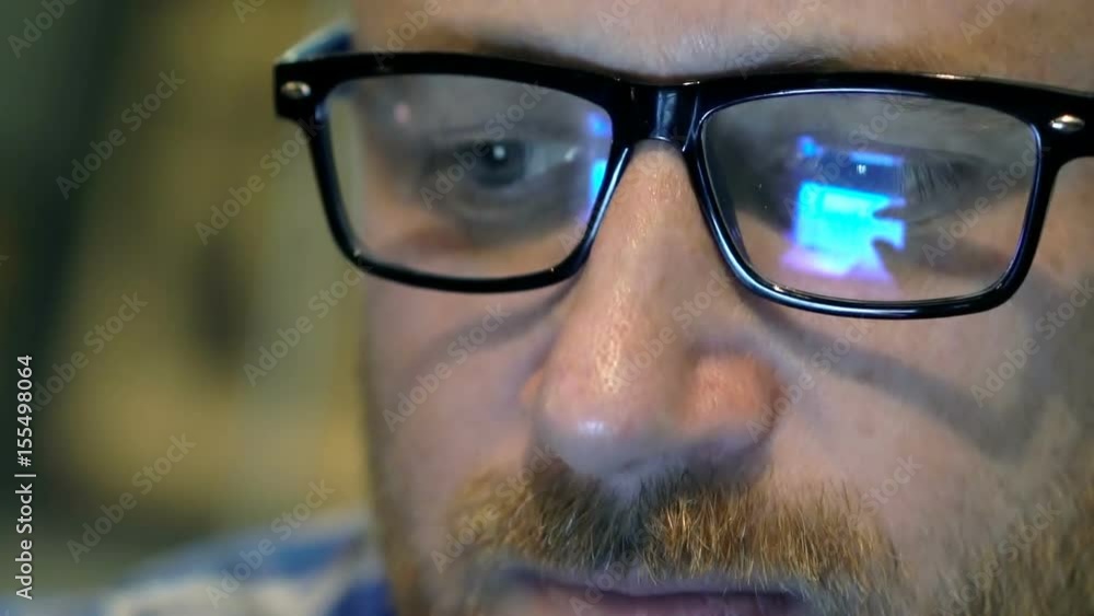 Closeup of male's face with glasses and facial hair, steadycam shot
Closeup of male's face with glasses and facial hair, steadycam shot