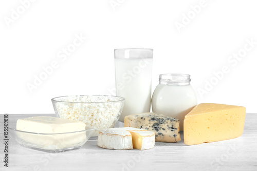Different dairy products on wooden table