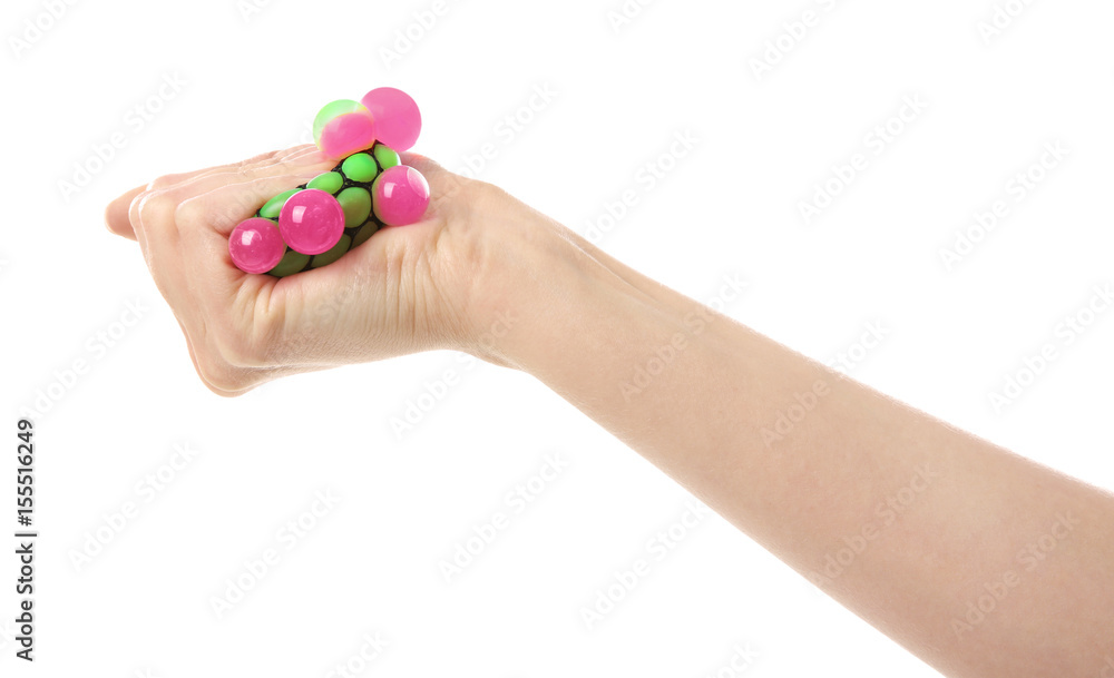 Female hand with stress ball on white background Female hand with stress ball on white background