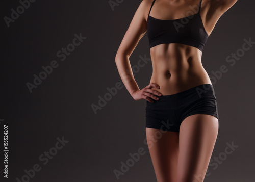 Sport. Woman sport body strong and beautiful © stasnds