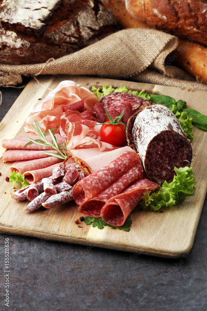 Food tray with delicious salami, pieces of sliced ham, sausage, Food tray with delicious salami, pieces of sliced ham, sausage,