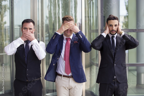 Photography handsome businessmen as the three wise monkeys