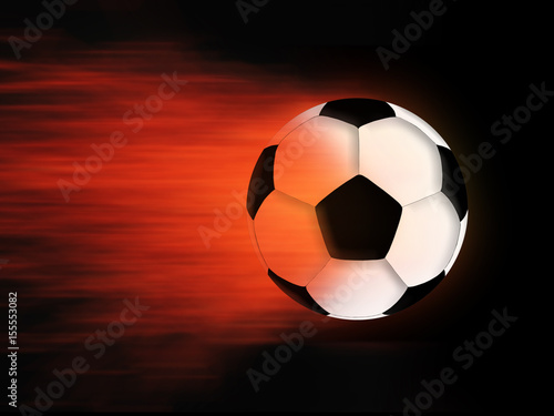 Soccer ball and flame on a black background
