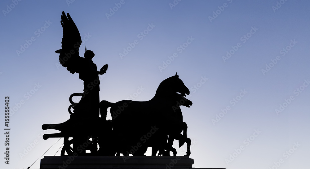 Silhouette of the Unity statue on the building of Vittoriano