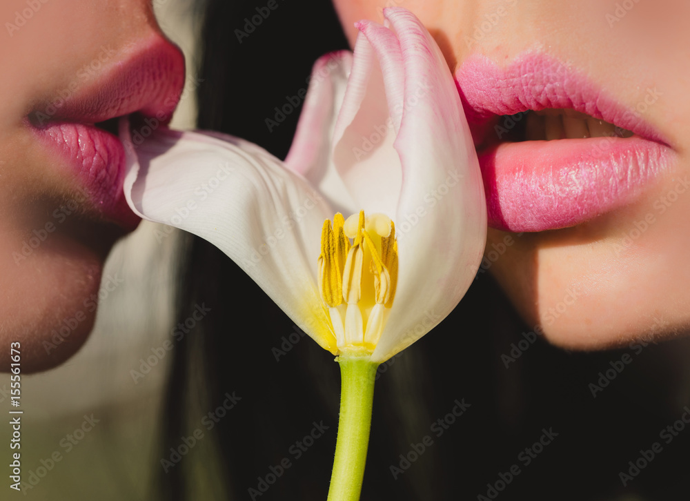 Naklejka premium lips or woman and girl with pink lipstick, lesbian love