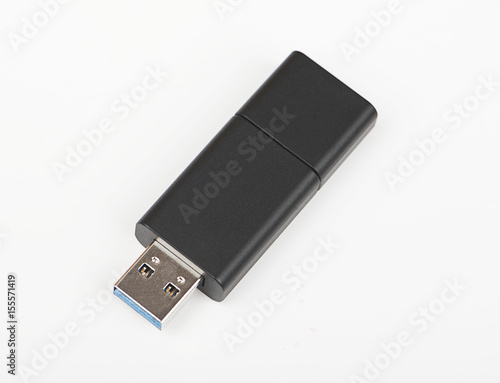 Pendrive on white background. Isolated. photo