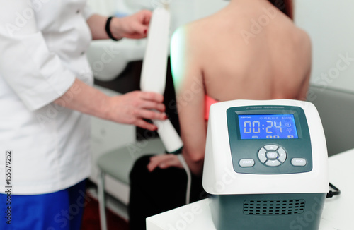 doctor spends psoriasis treatment using ultraviolet lamps and phototherapy. Skin diseases, eczema, dermatitis, shingles, peeling