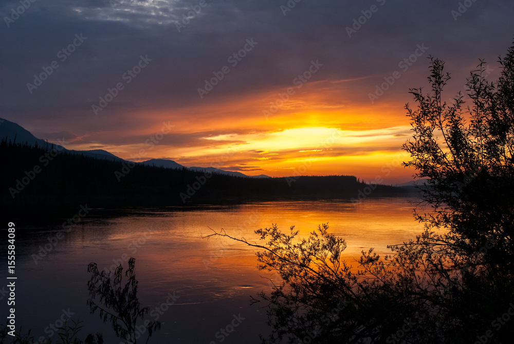 Sunset at Teslin river in Yukon territory, Canada