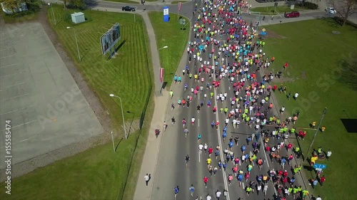 Aerial View of Lattelecom Marathon 2017, Runners run at the Riga International Marathon on May 14, 2017, Riga, Latvia, People run down the Streets between Daugava RIver and Park photo