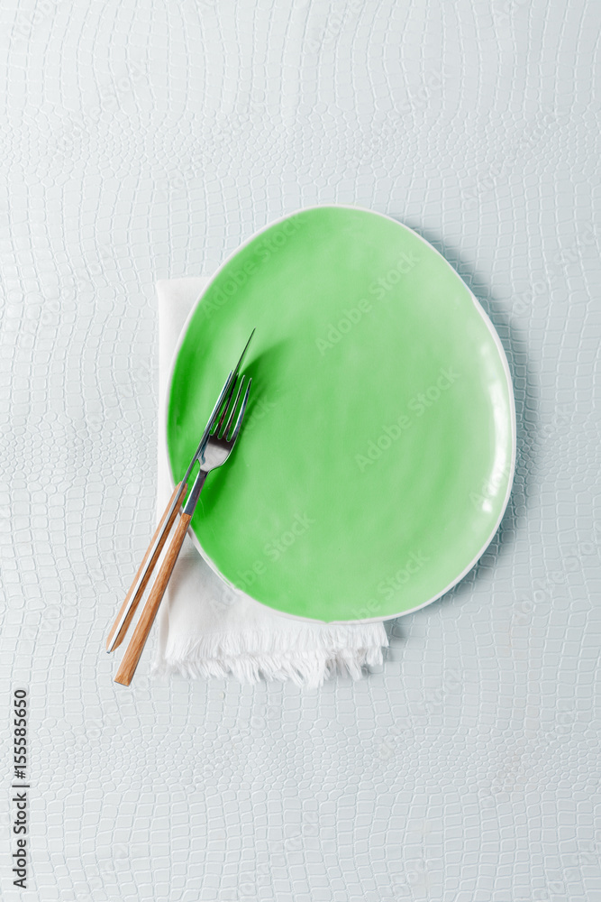 Empty plate and cutlery Empty plate and cutlery